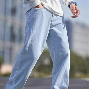Option 1 (Recommended): Men's light blue loose fit mid-rise denim jeans by DENIM LOOK Option 2 (Descriptive): Front view of DENIM LOOK men's loose fit mid-rise light blue denim jeans